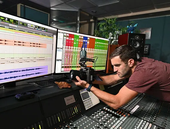 Sound technician in recording studio